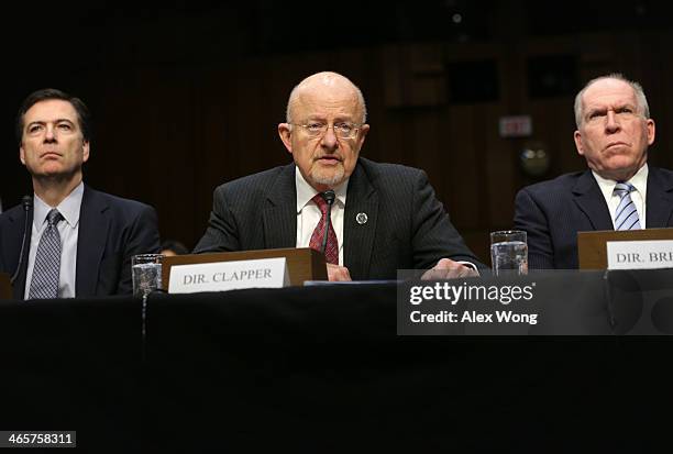 Director James Comey, Director of National Intelligence James Clapper, and CIA Director John Brennan testify during a hearing before Senate...