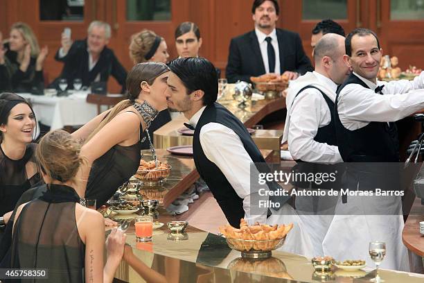 Cara Delevingne and Baptiste Giabicon seen during the Chanel show as part of the Paris Fashion Week Womenswear Fall/Winter 2015/2016 on March 10,...