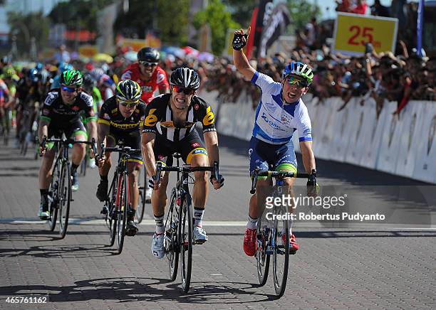 Caleb Ewan of Orica Greenedge and Youcef Reguigui of MTN-Qhubeka react after cross the finish line at Stage 3 of the 2015 Le Tour de Langkawi from...