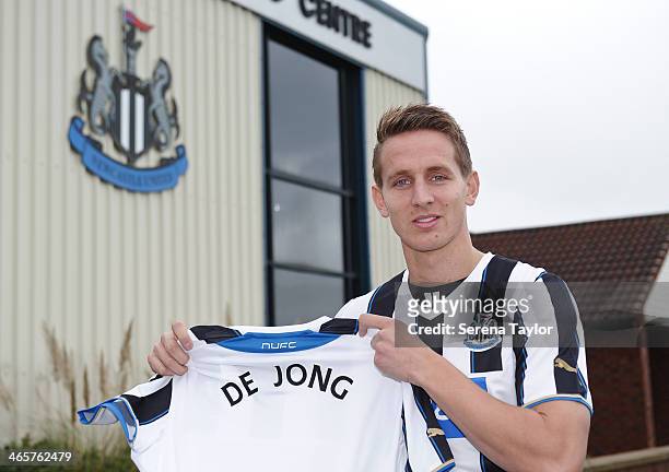 New Signing Luuk de Jong holds his shirt at the Newcastle United Training Centre on January 29 in Newcastle upon Tyne, England.