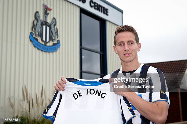 New Signing Luuk de Jong holds his shirt at the Newcastle United Training Centre on January 29 in Newcastle upon Tyne, England.