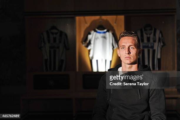 New Signing Luuk de Jong poses for photographs in the dressing room at St.James' Park on January 29 in Newcastle upon Tyne, England.