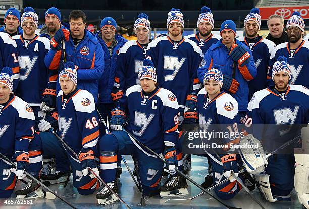 Captain John Tavares of the New York Islanders poses for a group photo with his teammates during the 2014 NHL Stadium Series practice session at...