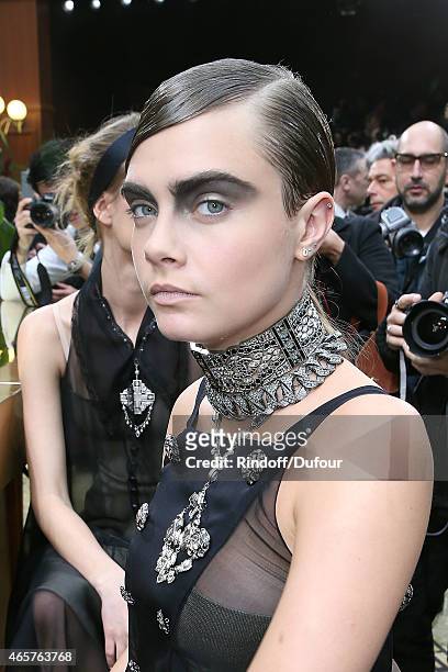 Cara Delevingne attends the Chanel show as part of the Paris Fashion Week Womenswear Fall/Winter 2015/2016 at Grand Palais on March 10, 2015 in...
