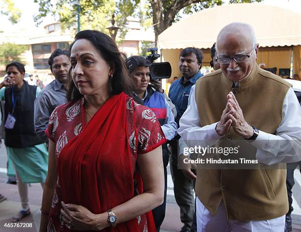 Leaders LK Advani with Hema Malini at Parliament House during budget session on March 10, 2015 in New Delhi, India. Facing stiff opposition over the...