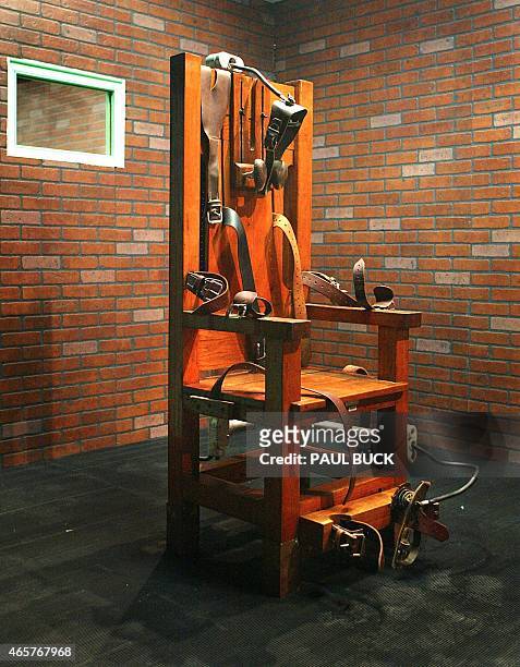 This photograph is an exhibit showing the electric chair nicknamed "Old Sparky" which stands at the Texas Prison Museum in Huntsville,Texas 07...
