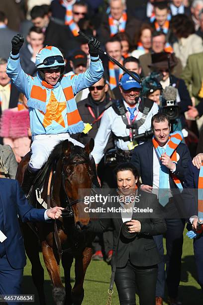 Ruby Walsh celebrates victory on Un De Sceaux in the Racing Post Arkle Challenge Trophy Steeplechase on day one at Cheltenham Racecourse on March 10,...