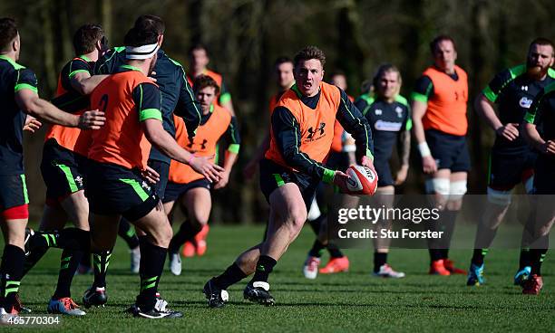 Wales centre Jonathan Davies makes a break during Wales open training ahead ahead of saturday's RBS Six Nations match against Ireland at the Vale...