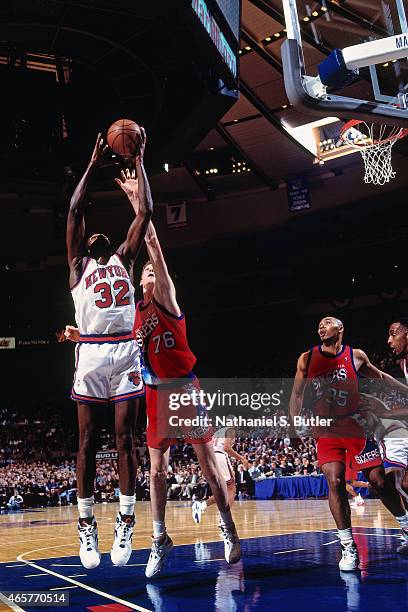 Herb Williams of the New York Knicks rebounds on November 9, 1993 at Madison Square Garden in New York City. NOTE TO USER: User expressly...