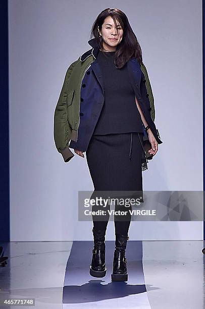 Designer Chitose Abe walks the runway during the Sacai show as part of the Paris Fashion Week Womenswear Fall/Winter 2015/2016 on March 9, 2015 in...