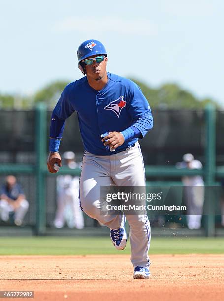 Ramon Santiago of the Toronto Blue Jays runs the bases during the Spring Training game against the Detroit Tigers at Joker Marchant Stadium on March...