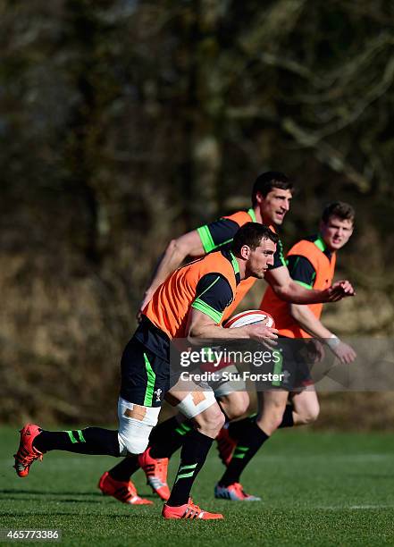 Wales captain Sam Warburton runs with the ball during Wales open training ahead ahead of saturday's RBS Six Nations match against Ireland at the Vale...