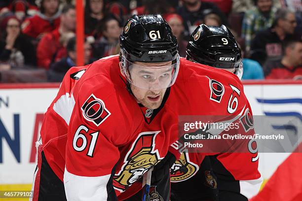 Mark Stone of the Ottawa Senators prepares for a faceoff against the Calgary Flames at Canadian Tire Centre on March 8, 2015 in Ottawa, Ontario,...