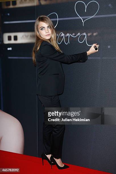 Yves Saint Laurent Beauty With Cara Delevingne Celebrating The Luxurious Mascara For A False Lash Effect at Galeries Lafayette on March 10, 2015 in...