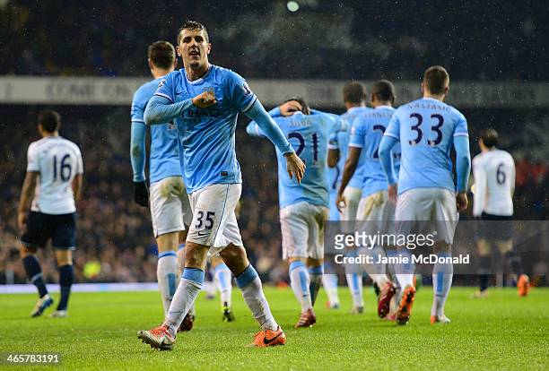 Steven Jovetic of Manchester City celebrates scoring their fourth goal during the Barclays Premier League match between Tottenham Hotspur and...