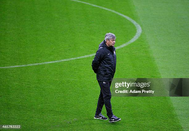 Mircea Lucescu Head Coach of Shakhtar Donetsk walks on the pitch during the Shakhtar Donetsk training session and press conference at Allianz Arena...