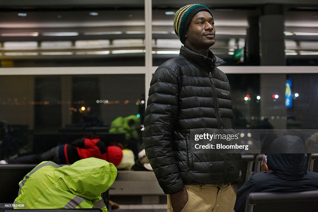 NYC's Record Homeless Population Seeks Shelter at LaGuardia