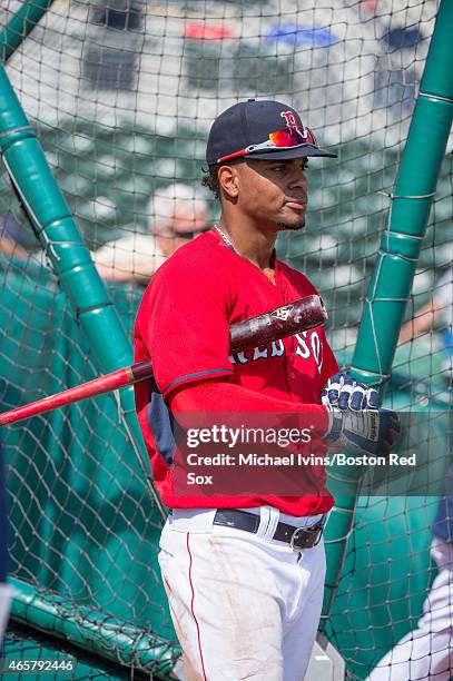 Xander Bogaerts of the Boston Red Sox adjusts his batting gloves before taking batting pratice at jetBlue Park in Fort Myers, Florida on March 6,...