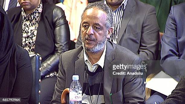 In this photo taken from video, Amira Abase's father Hussen Abase attends an evidence session at Parliaments Home Affairs Select Committee in the...