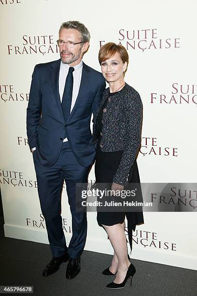 Kristin Scott Thomas and Lambert Wilson attend 'Suite Francaise' Premiere at Cinema UGC Normandie on March 10, 2015 in Paris, France.