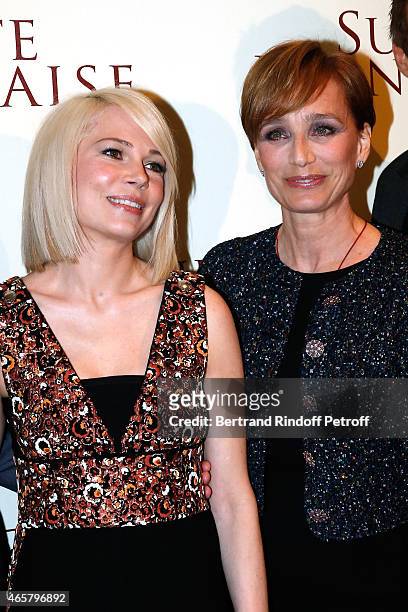 Michelle Williams and Kristin Scott Thomas attend the world premiere of "Suite Francaise" at Cinema UGC Normandie on March 10, 2015 in Paris, France.