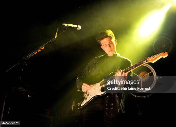 Dan Rothman of London Grammar performs a sold out show at Manchester Academy on January 29, 2014 in Manchester, England.