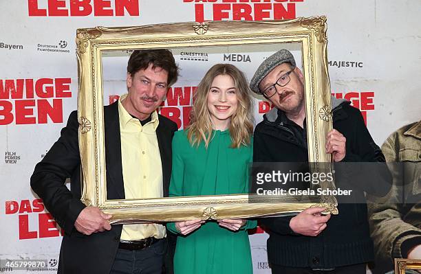Tobias Moretti, Nora von Waldstaetten, Josef Hader during the premiere of the film 'Das ewige Leben' at City Kino on March 10, 2015 in Munich,...