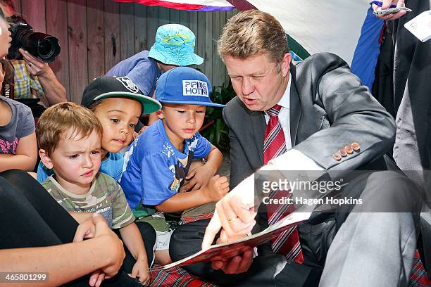 To R, Ryder Austin, Linkyn Leni-Aoake and Carl Davey listen while Labour leader David Cunliffe reads a book during a visit to Trentham Kindergarten...