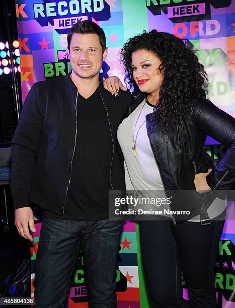 Singer Nick Lachey and actress Michelle Buteau attend the 2015 MTV Break the Record Week Dance-A-Thon at Times Square on March 10, 2015 in New York...