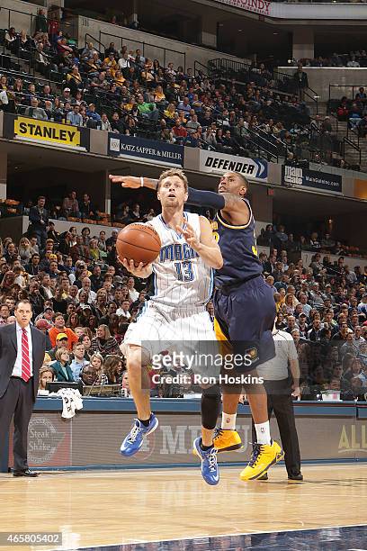 Luke Ridnour of the Orlando Magic shoots the ball against the Indiana Pacers on March 10, 2015 at Bankers Life Fieldhouse in Indianapolis, Indiana....