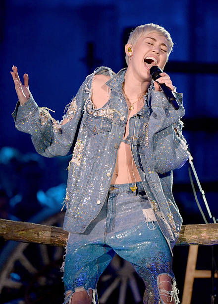 Recording artist Miley Cyrus performs onstage during Miley Cyrus: MTV Unplugged at Sunset Gower Studios on January 28, 2014 in Hollywood, California.
