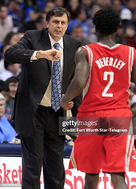 Houston Rockets head coach Kevin McHale gives instruction to point guard Patrick Beverley during the first period against the Dallas Mavericks at the...