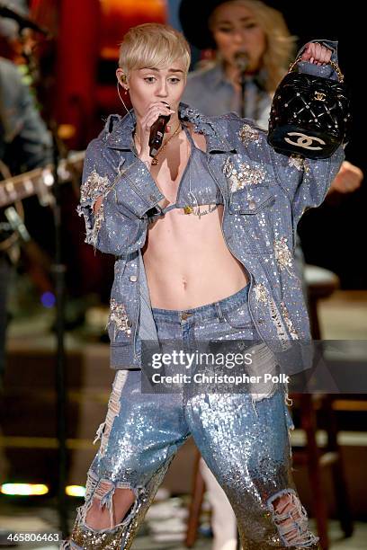 Recording artist Miley Cyrus performs onstage during Miley Cyrus: MTV Unplugged at Sunset Gower Studios on January 28, 2014 in Hollywood, California.