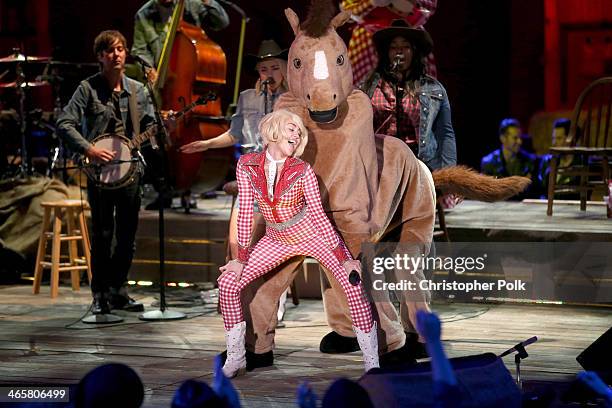 Recording artist Miley Cyrus performs onstage during Miley Cyrus: MTV Unplugged at Sunset Gower Studios on January 28, 2014 in Hollywood, California.