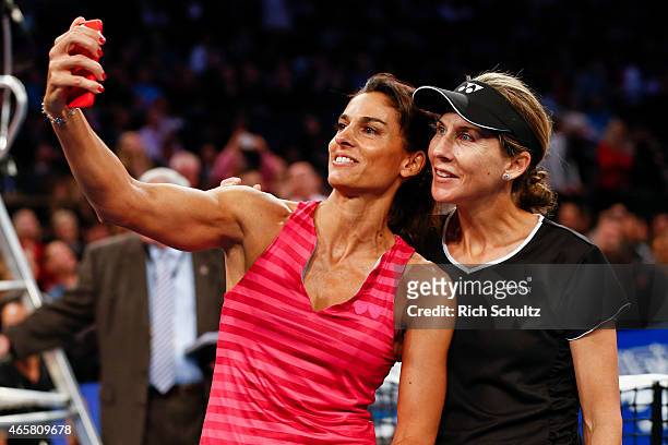 Gabriela Sabatini of Argentina and Monica Seles of the United States pose for a selfie during the BNP Paribas Showdown at Madison Square Garden on...