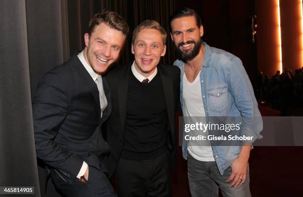 Friedrich Muecke, Matthias Schweighoefer, Tom Beck attend the premiere of the film 'Vaterfreuden' at Mathaeser Filmpalast on January 29, 2014 in...