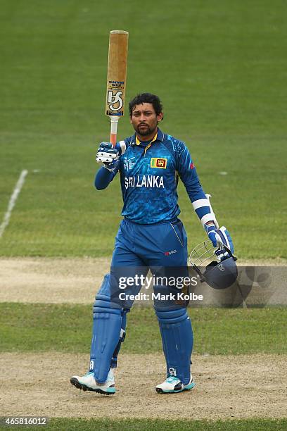 Tillakaratne Dilshan of Sri Lanka celebrates his century uring the 2015 Cricket World Cup match between Sri Lanka and Scotland at Bellerive Oval on...