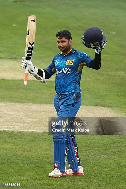 Kumar Sangakkara of Sri Lanka celebrates his century during the 2015 Cricket World Cup match between Sri Lanka and Scotland at Bellerive Oval on...