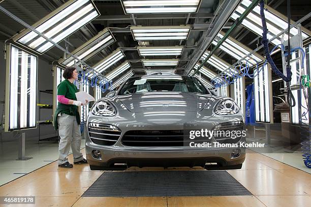 Quality control of a Porsche Cayenne at a Volkswagen plant on March 03, 2011 in Bratislava, Slovakia. In this plant the VW Touareg and Audi Q7 models...
