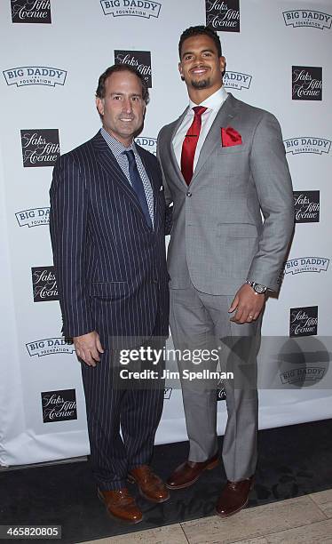 Saks Fifth Avenue Senior Vice President Tom Ott and Football player Corey Wootton attend 2014 Fashion Meets Football at Saks Fifth Avenue on January...