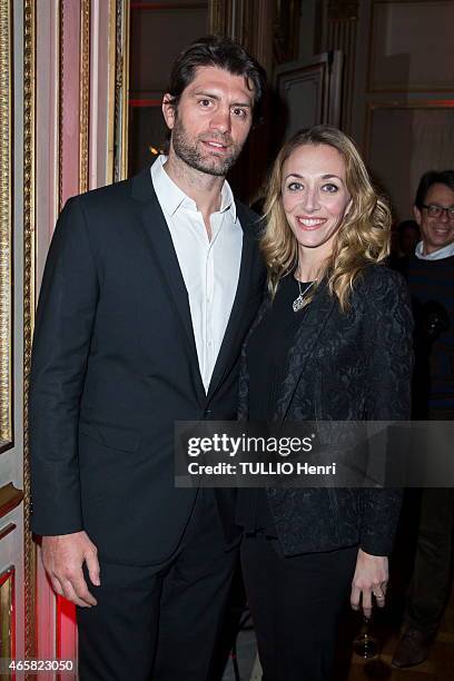 Laurie Delhostal and Pierre Rabadan attend the Jeweler Poiray 40th Anniversary Gala at the Mona Bismarck American Center on February 12, 2015 in...