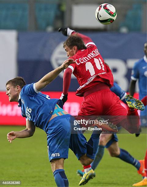 Igor Denisov of FC Dinamo Moscow challenged by Maksim Semakin of FC Ufa Ufa during the Russian Premier League match between FC Dinamo Moscow and FC...