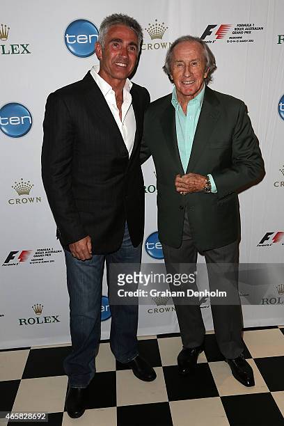 Former F1 World Champion Sir Jackie Stewart poses with former Grand Prix motorcycle road racing World Champion Mick Doohan during the GP@23 Official...