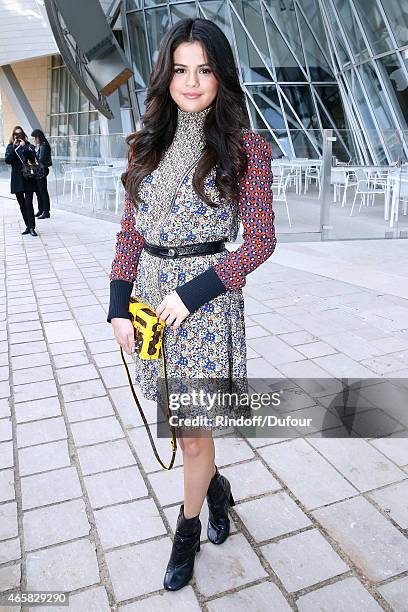 Actress Selena Gomez attends the Louis Vuitton show as part of the Paris Fashion Week Womenswear Fall/Winter 2015/2016 on March 11, 2015 in Paris,...