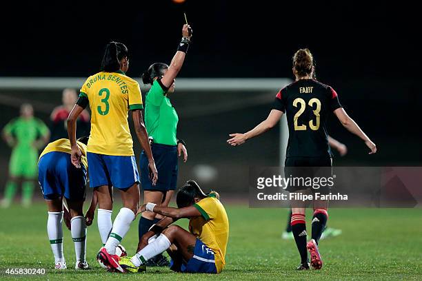 Verena Faisst of Germany receives the yellow card during the Women's Algarve Cup match between Brazil and Germany on March 9, 2015 in Parchal,...