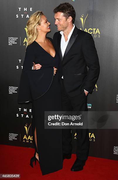 Lara Bingle and Sam Worthington arrive at the 3rd Annual AACTA Awards Ceremony at The Star on January 30, 2014 in Sydney, Australia.