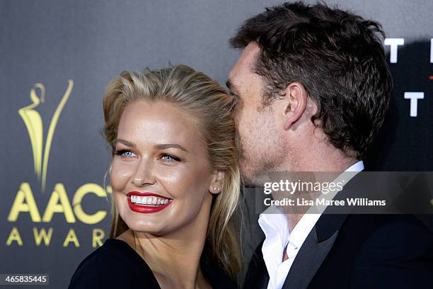 Lara Bingle and Sam Worthington arrive at the 3rd Annual AACTA Awards Ceremony at The Star on January 30, 2014 in Sydney, Australia.