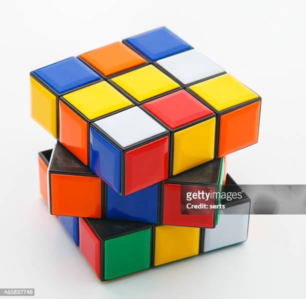 rubik's cube - rubiks cube stock-fotos und bilder