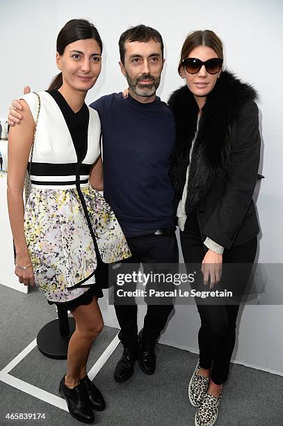 Giovanna Battaglia, Giambattista Valli and Bianca Brandolini attend the Moncler Gamme Rouge show as part of the Paris Fashion Week Womenswear...