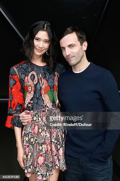 Tao Okamoto and Fashion Designer Nicolas Ghesquiere pose after the Louis Vuitton show as part of the Paris Fashion Week Womenswear Fall/Winter...